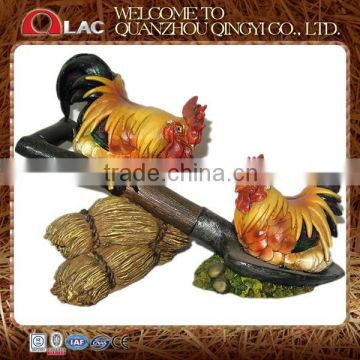 resin two roosters sitting on spade statue animal garden ornaments