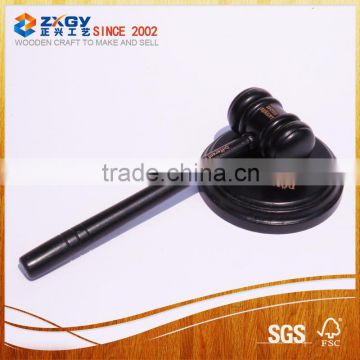 Black rubber wood hammer with round base