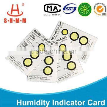 Color change moisture indicator stickers