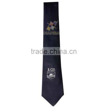 School plain tie in black with logo
