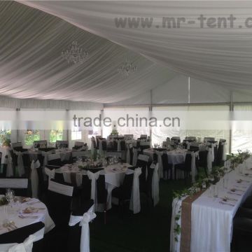 White roof aluminum tent with white wedding decorations
