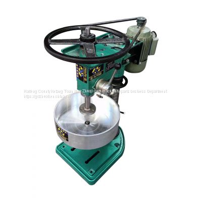 Machine for fine grinding round beads of colored gemstones