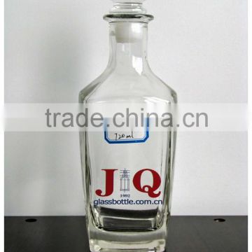 clear square glass vodka bottle with glass stopper