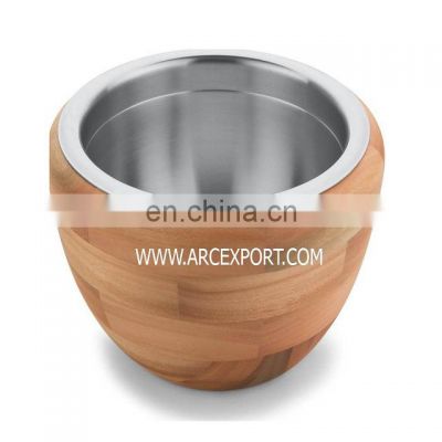 wooden round bowl inside stainless steel bowl