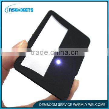 Credit card magnifier with LED
