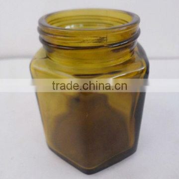 hexagonal amber essence oil bottle