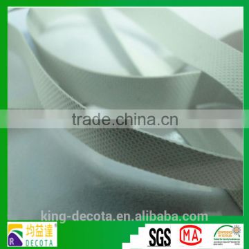 Textured natural rubber elastic tape used for swimwear