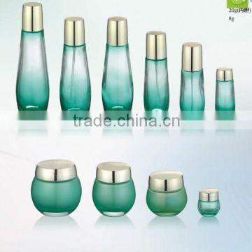 green transparent glass bottle