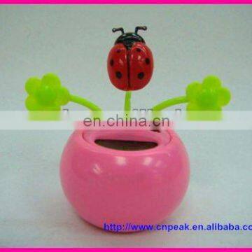 New LadyBug Solar Power Flip Flap Dancing Toy two green flower leaves toy