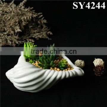 Small white porcelain office flower pot