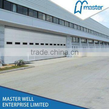 Overhead sectional double track high speed industrial door