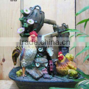 Fountain with rooster and hen and chicken