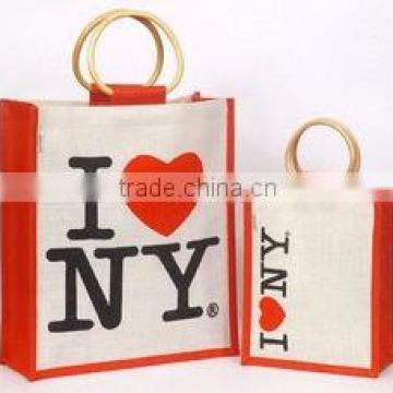 Jute surdy bags with heart print with cane handle