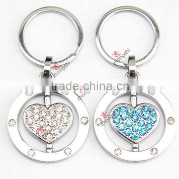 Wholesale persoanalized rotatable crystal heart keychains