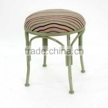 metal chair with linen cushion