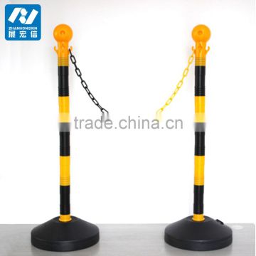 Yellow/Black Water filled barrier with plastic chain