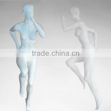 Female sport mannequins with abstract head in matt white
