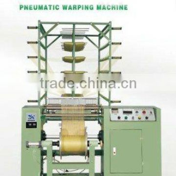 Pneumatic warping machine