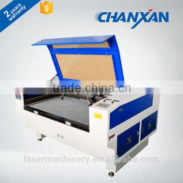 website nancyhyy88 60W CO2 auto feeding fabric ribbon and fabric laser cutting machine