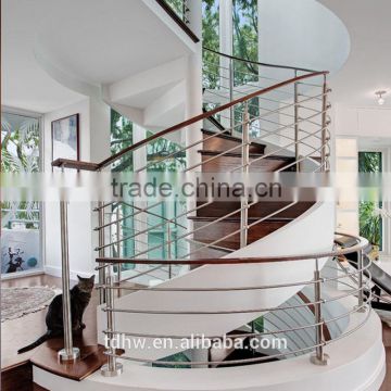 Interior Stainless Steel Spiral Stairs with Stained Poplar Treads and Rail