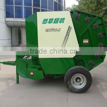 Round baler with tractor