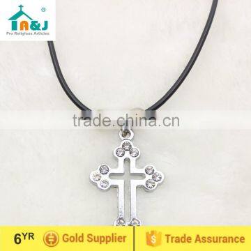 Maltese cross cord pendant