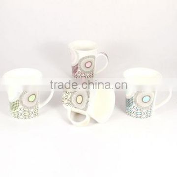 Shiny mugs and cups with different designs
