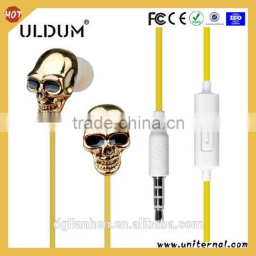 ULDUM brand fashionable skeleton headphones stereo sound skull head earphone wholesale for mp3 mobile phone