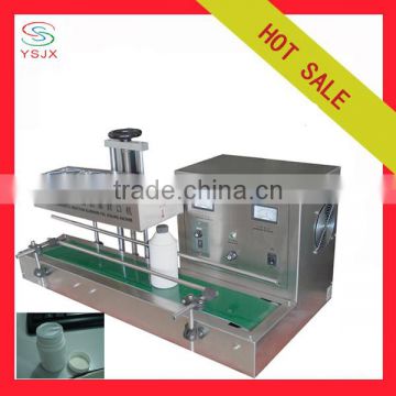 Automatic induction small aluminum foil bottles sealing machine for medicine