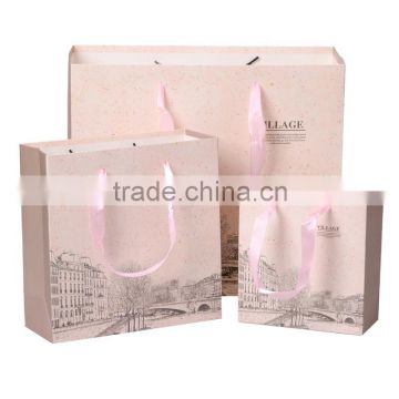Customized printing fashion gift paper bag with ribbon handle