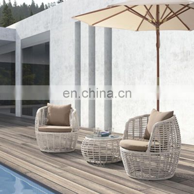 Outdoor coffee shop open-air table with large sunshade hypaethral furniture