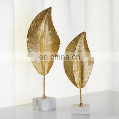 gold plated leaf fancy sculpture