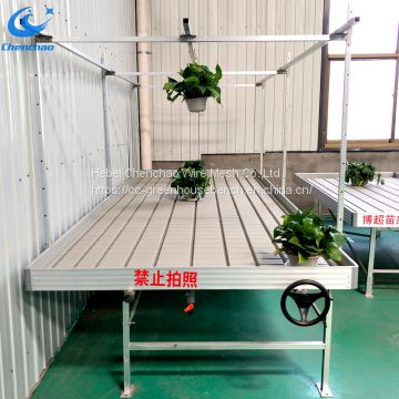 Ebb and flow bench systems rolling table in greenhouse plants