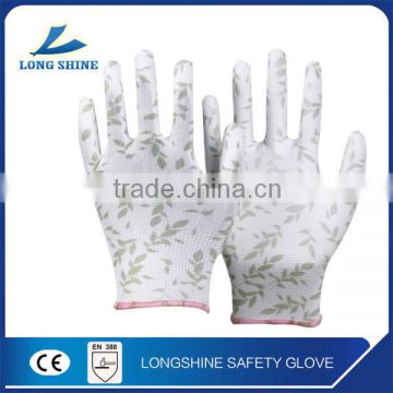 Low Price 10G Nylon/Polyester PU Coated Leaves Printed Safety Glove for Protection