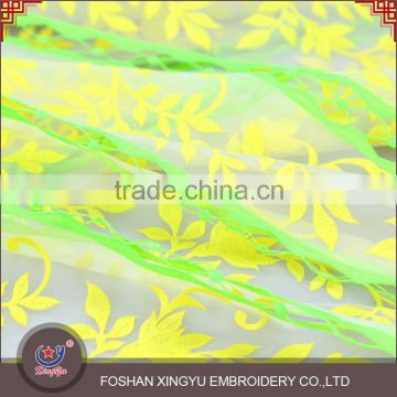 2016 new fashion promotional multi color crystal embroidery and laser voile tulle fabric wholesale fabric for clothing