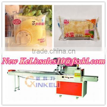 Fruit cake automatic flow packaging machine