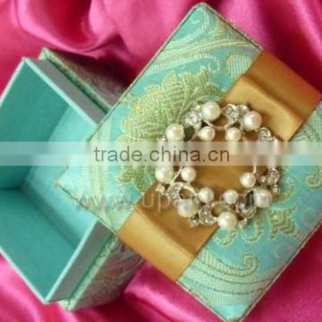 Brocade Favor Box with pearl brooch