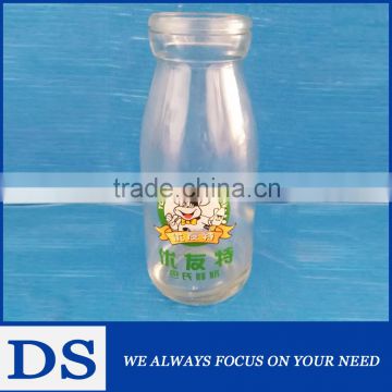 Small glass bottle with decal for beverage & juice & milk