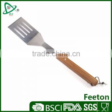 Stainless steel slotted turner