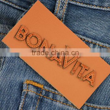 Low price top quality color embossed leather patches