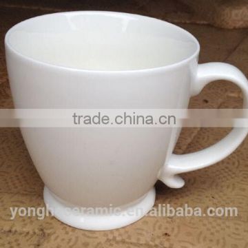 Factory wholesale ceramic white footed shape mugs and cups