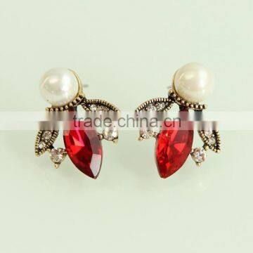 red rhinestone horse eye earrings with big pearl