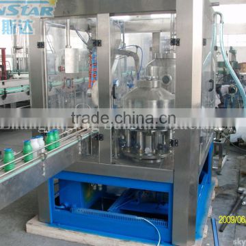 Automatic bottle filling and aluminum foil sealing plant