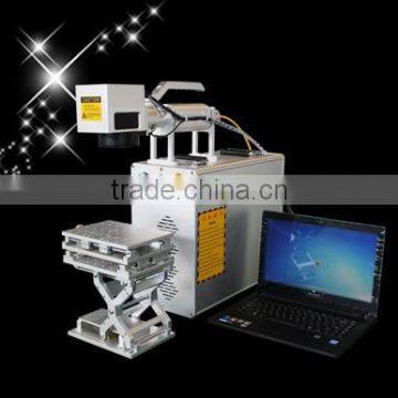 Raycis fiber laser marking machine on mobile watch phones