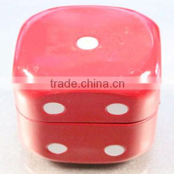Red dice-shaped tin box