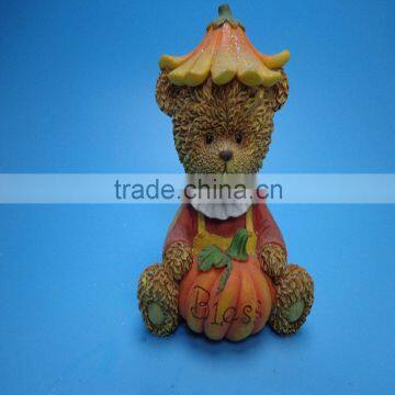 Bear sitting on the pumpkin harvest crafts for blessing autumn
