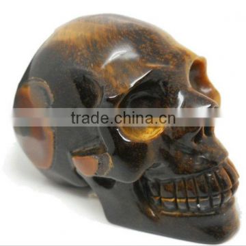 Different size semi-precious gmestone tiger eye skulls carving