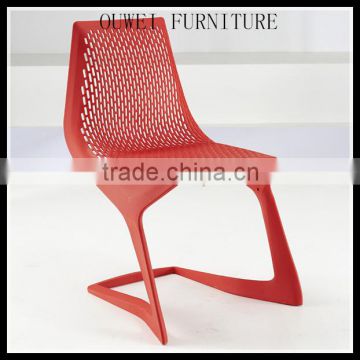 plastic high back chair with many holes