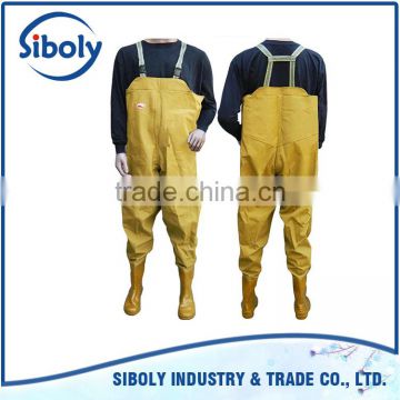 cheap waterproof pvc chest high waders being used as fish farming work wear