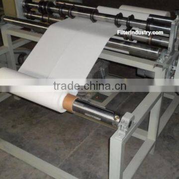 Auto filter paper slitting and rewinding machine